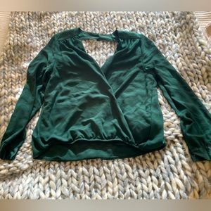 Emerald green wrap top with silk details